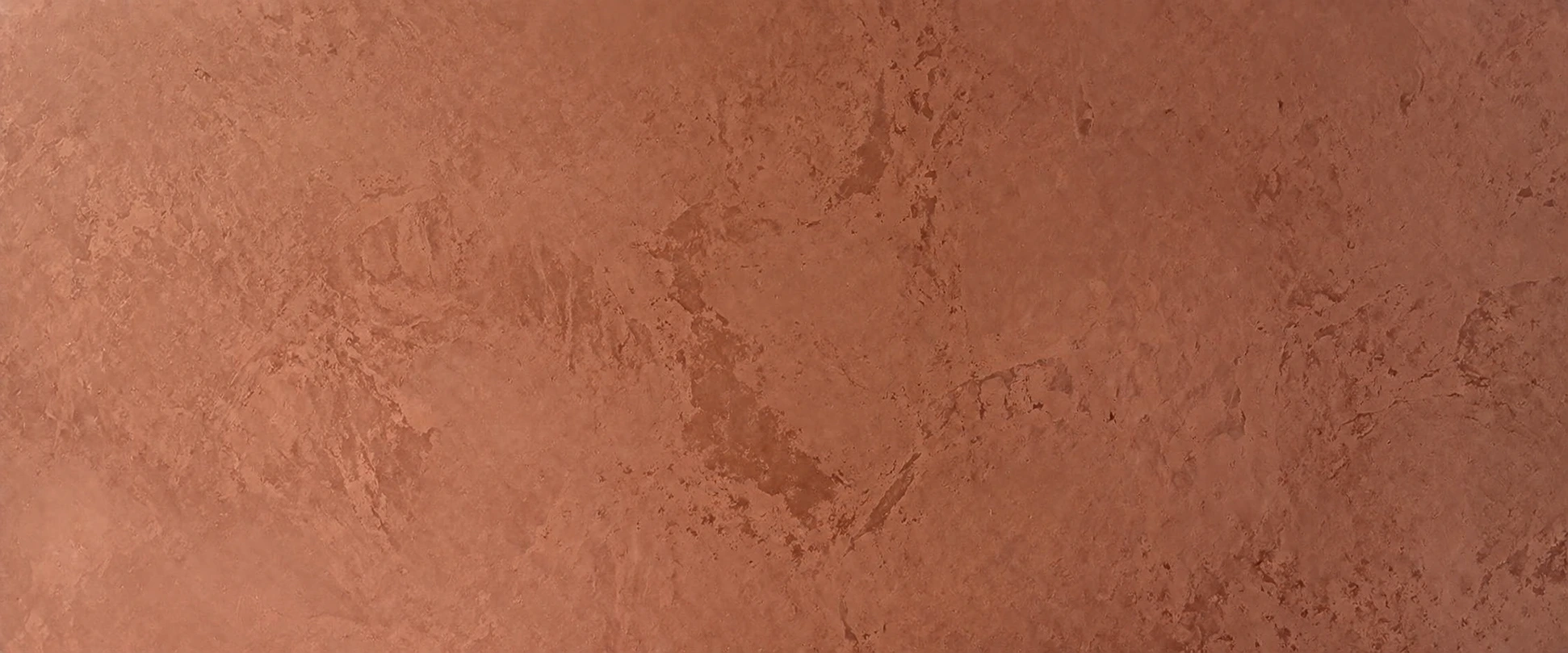 Hand applied Marrakesh Wall finish in warm mineral tones with natural light